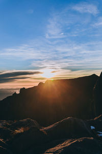 Scenic view of mountains against sky during sunset