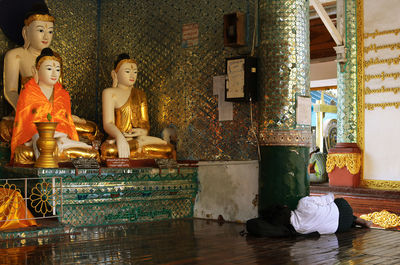 Statue of buddha outside building