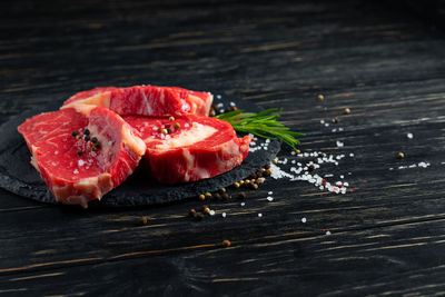 Close-up of strawberries in plate on table