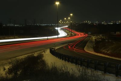 Light trails on road at night