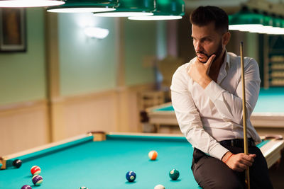 Man playing pool