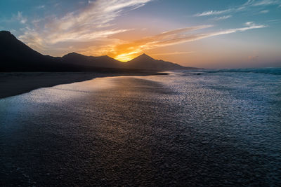 Scenic view of sea against sky during sunset