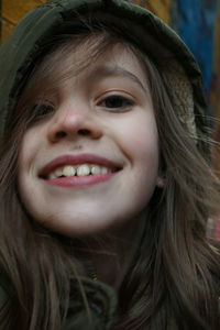 Close-up portrait of a smiling girl