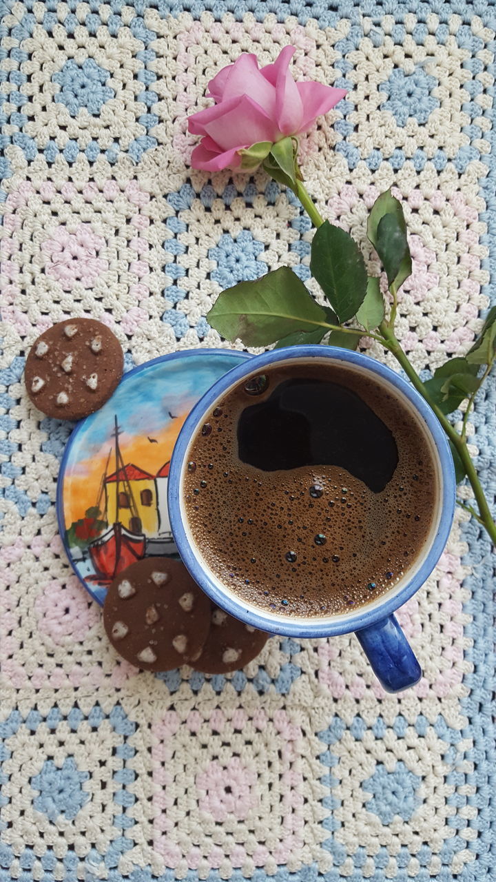 HIGH ANGLE VIEW OF COFFEE CUP ON TABLE AT HOME