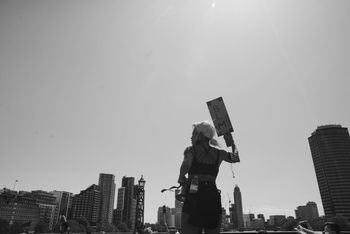 LOW ANGLE VIEW OF BUILDINGS AGAINST SKY IN CITY