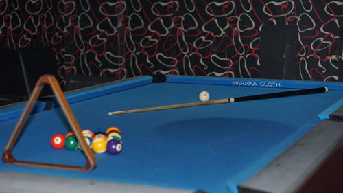 Close-up of blue ball on table