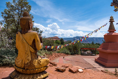 Statue of temple against sky