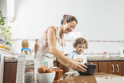 Mother and son on mobile phone