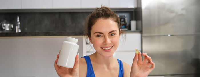 Young woman drinking coffee