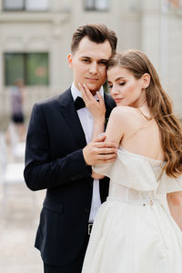 Young couple standing outdoors