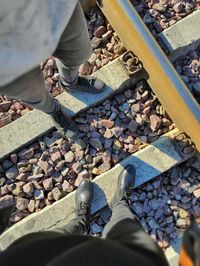 Low section of man on railroad track