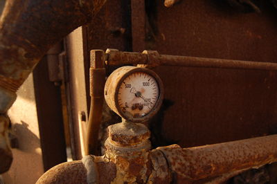 Close-up of old rusty machine part