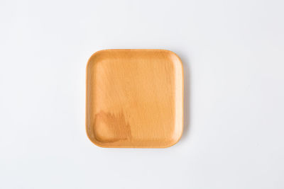 High angle view of bread on white background