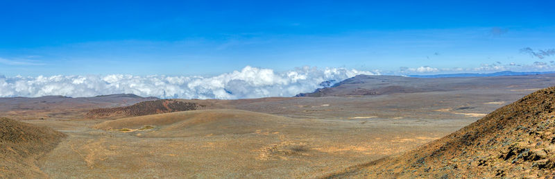 Panoramic view of landscape and mountains against sky