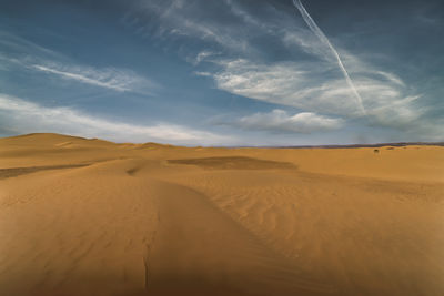 Scenic view of desert against sky