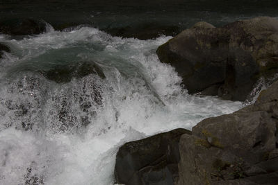 Waves splashing on rocks