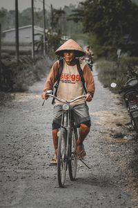 Man riding bicycle