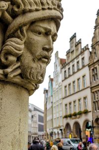 Statue of building in city