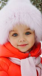 Portrait of smiling girl in snow