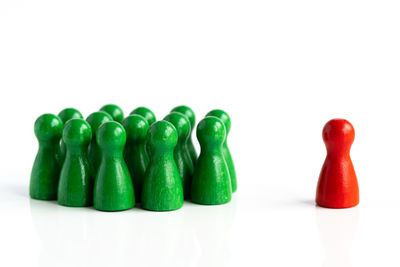 Close-up of figurines against white background