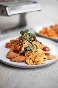 Close-up of food in plate on table