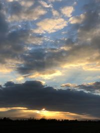 Low angle view of dramatic sky during sunset