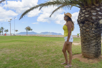 Portrait of a latin woman smiling and posing on a warm spring and summer day