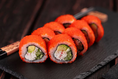 Close-up of sushi on cutting board