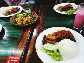 High angle view of food served on table