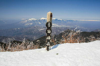 Snow covered mountain against sky