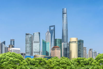 View of modern buildings against clear sky