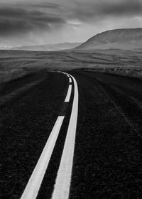 Surface level of road against the sky