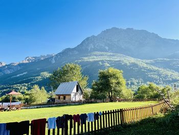 Scenic view of mountains against clear blue sky