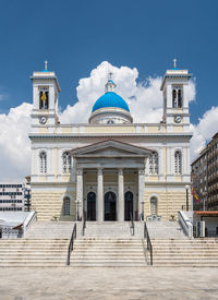 Facade of historic building against sky