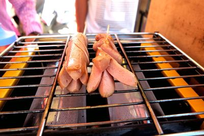 Close-up of meat on barbecue grill