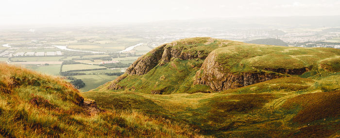 Panoramic view of scottish countryside from hilltop