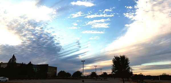 Low angle view of silhouette buildings against sky during sunset