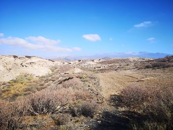 Scenic view of land against sky