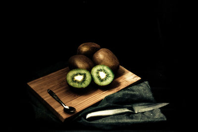 High angle view of fruits on cutting board