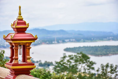 View of temple against building