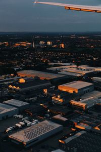 High angle view of illuminated buildings in city against sky