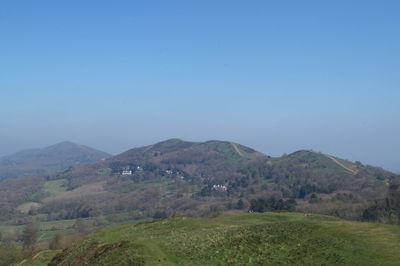 Scenic view of landscape against clear blue sky