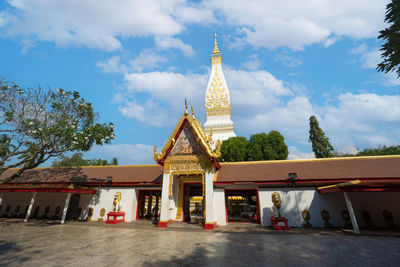 View of temple building against cloudy sky