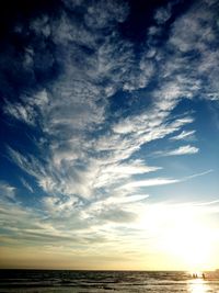 Scenic view of sea against dramatic sky