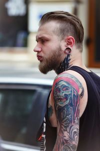 Portrait of young man looking away