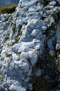 High angle view of snow on rocks