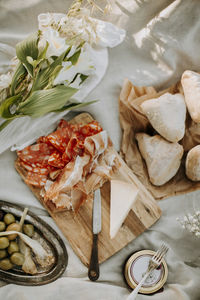 Ham and cheese board on table