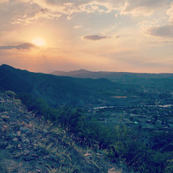 Scenic view of landscape against sky during sunset