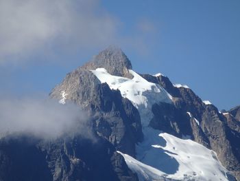 Scenic view of snow covered mountains