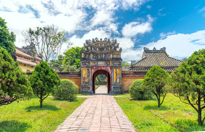 View of historical building against cloudy sky